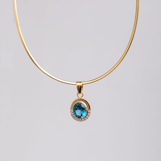 Aquamarine and Zircon Halo Pendant in Gold