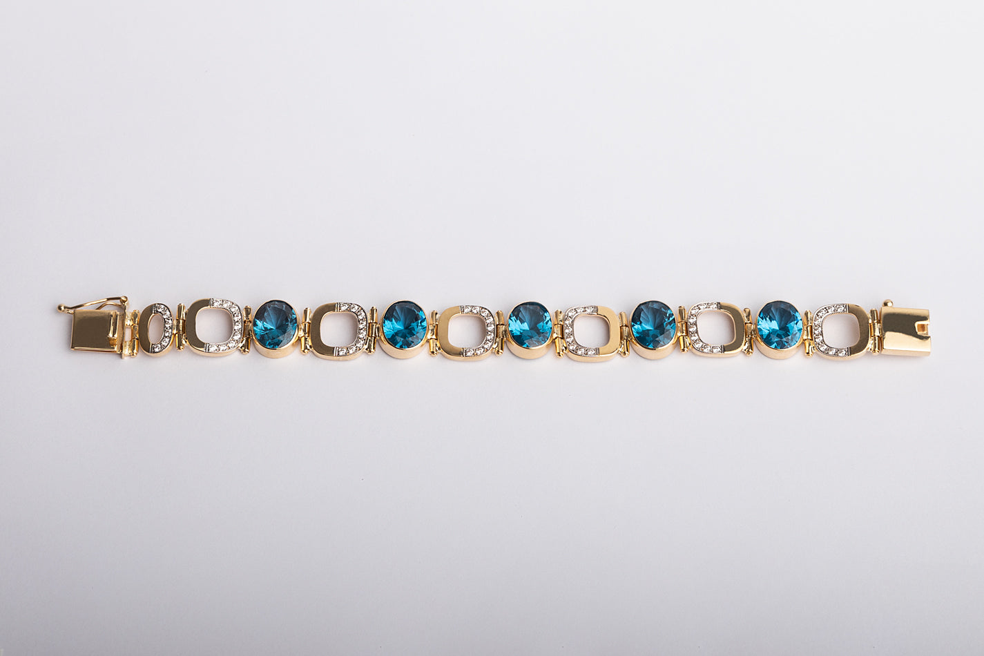 Aquamarine and Zircon Halo Bracelet in Gold